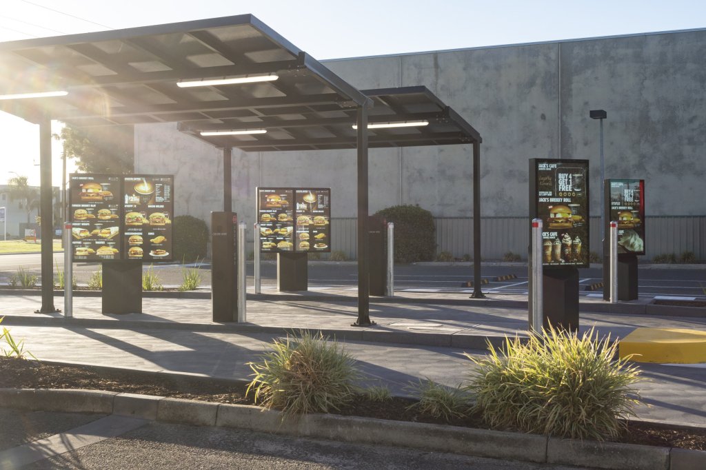 MacDonald's innovative drive thru solutions with pre-sell displays, order confirmation units and outdoor digital menu boards created by Coates.
